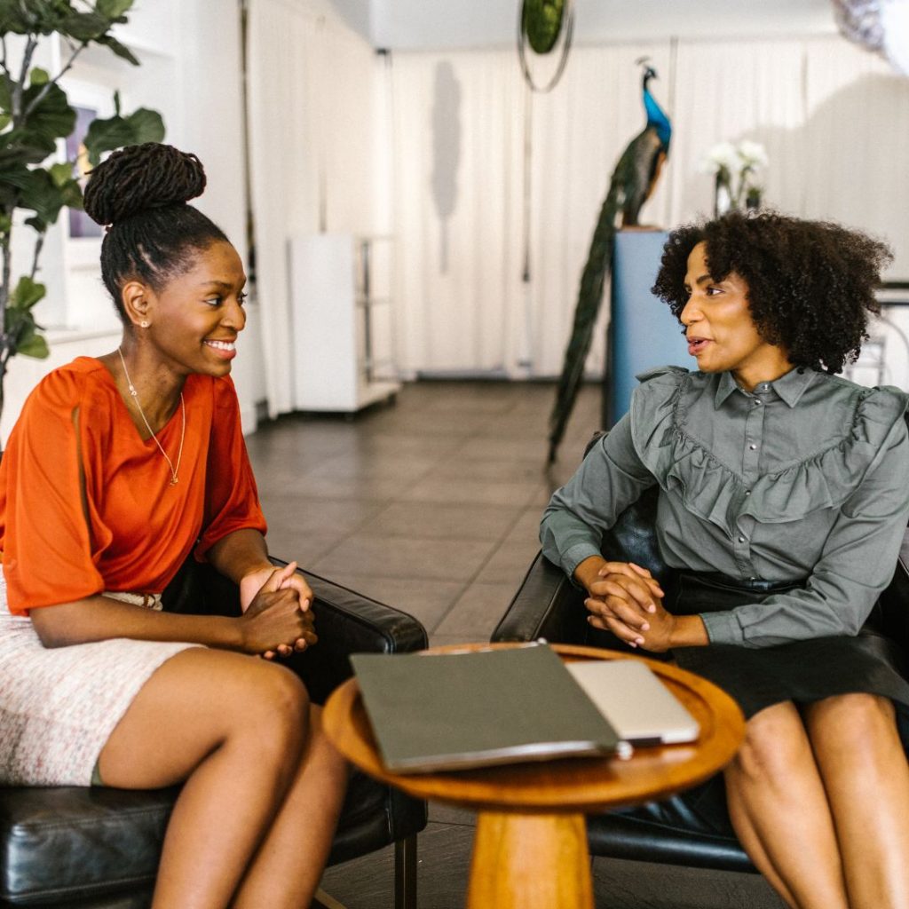 black women speaking together