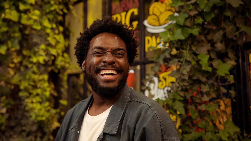 black man laughing