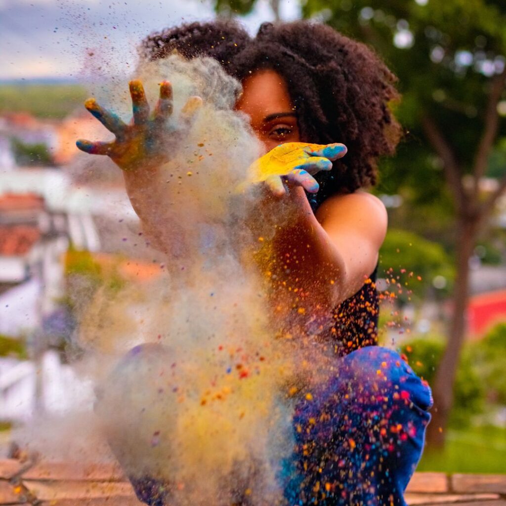 Navigating the Entertainment Industry: Tips for Black Content Creators 1 img of an African American woman doing art